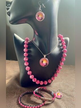 Girls Pink Swirl Bead Necklace and Penguins in Sunset Pendant Set, Bracelets